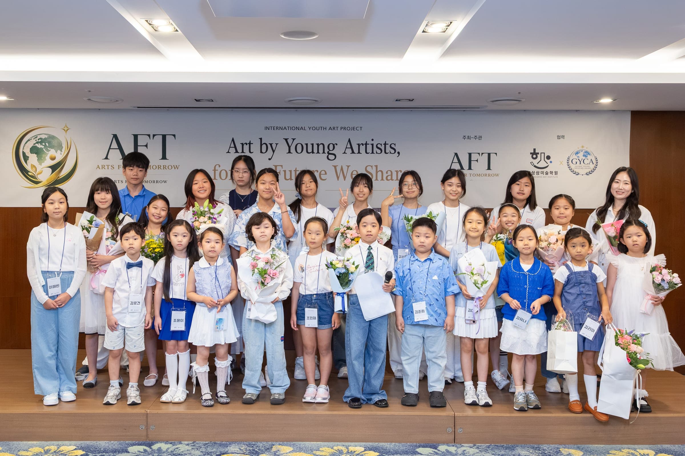 AFT young artists group photo at the exhibition