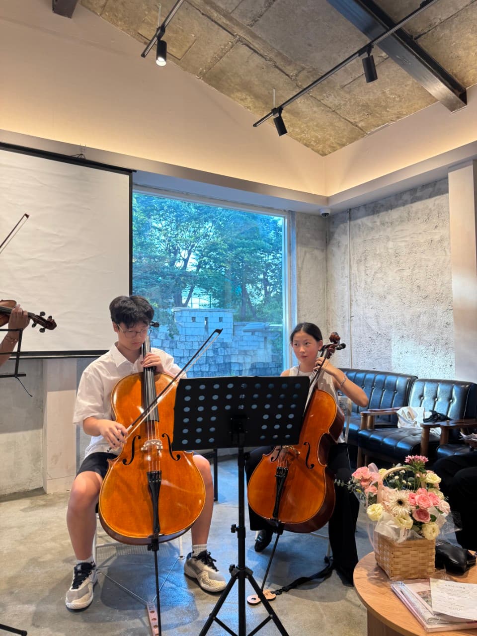 A cello duet at the opening reception